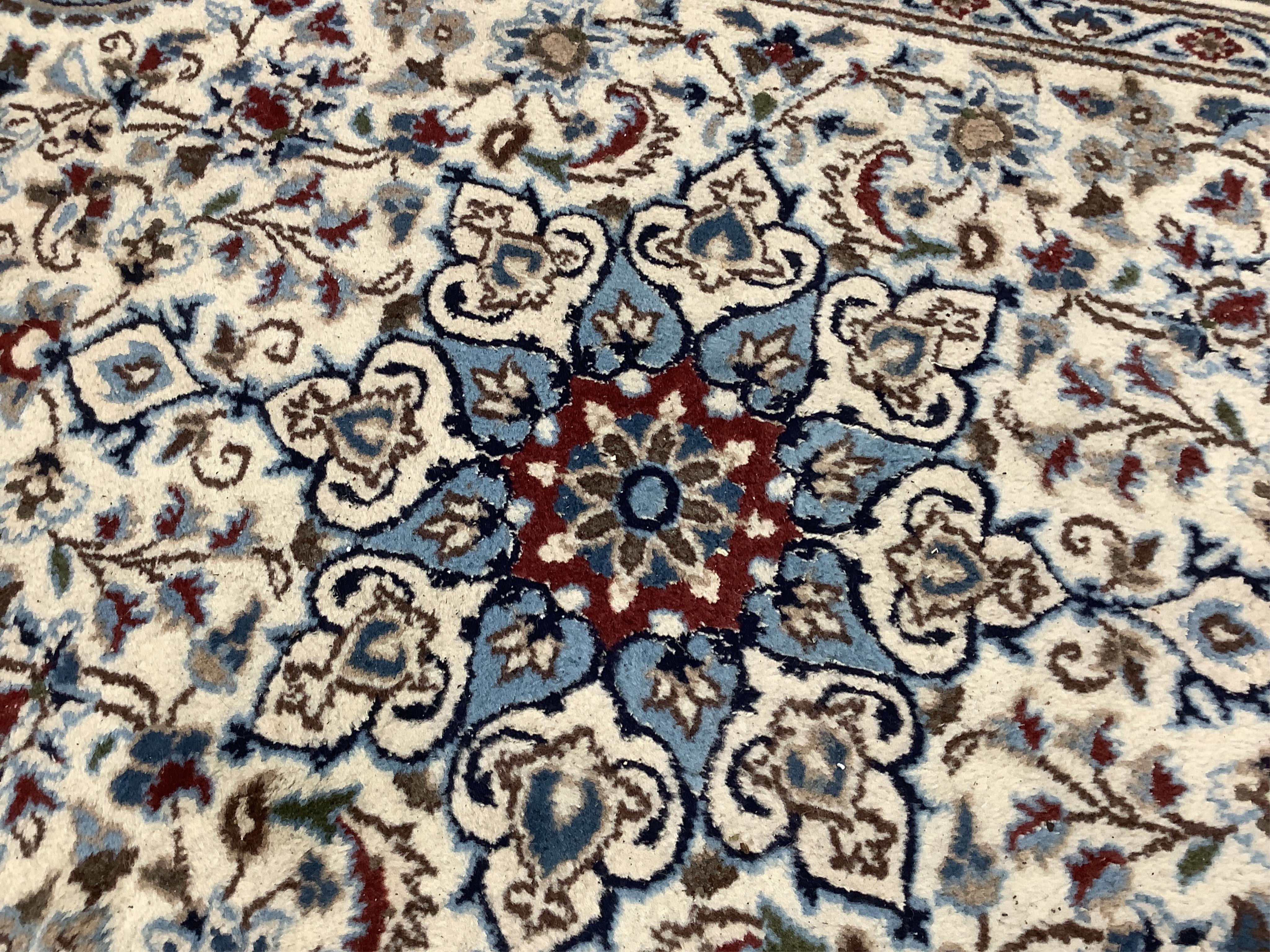 A Nain ivory ground runner, 386 x 86cm